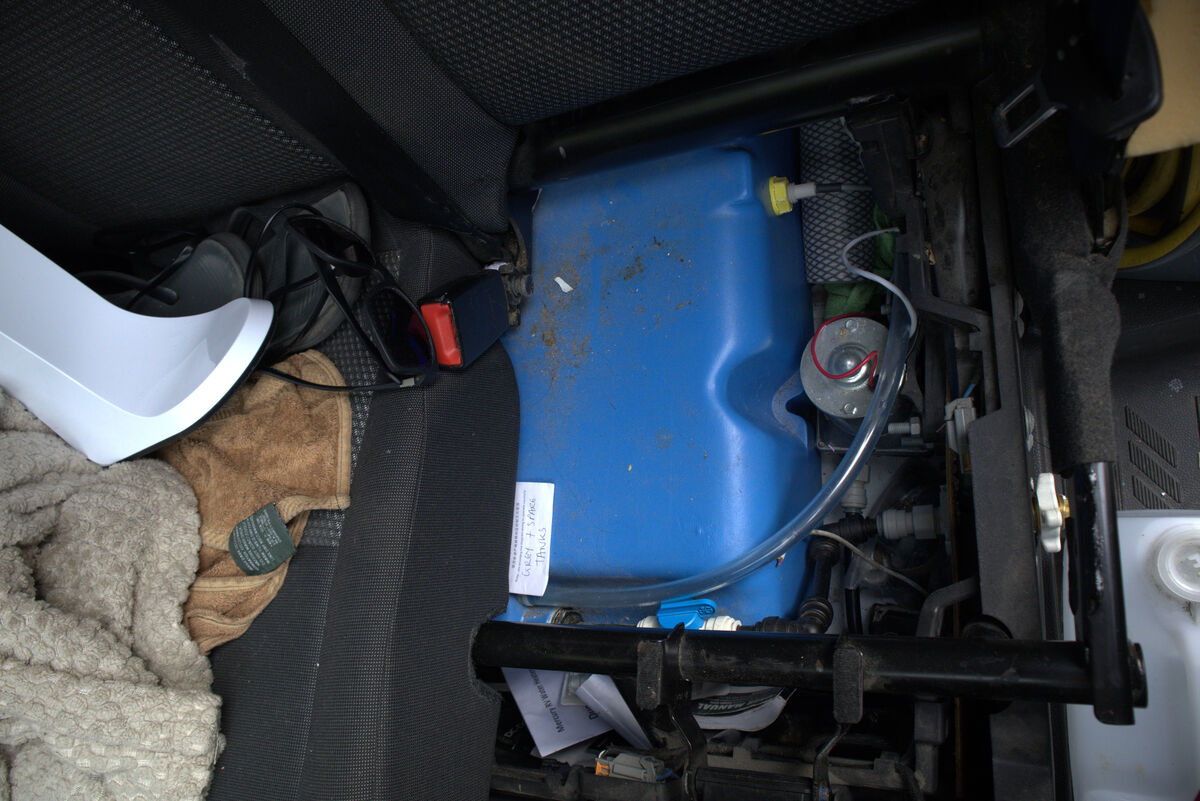 Fresh water tank with pump mounted beside it